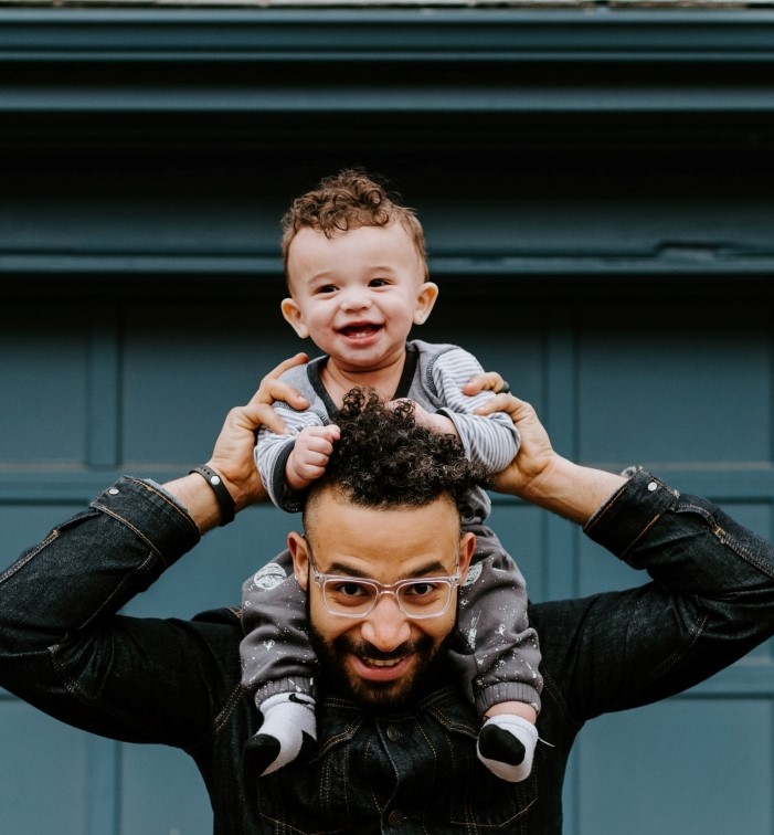 a photo of a happy father and child