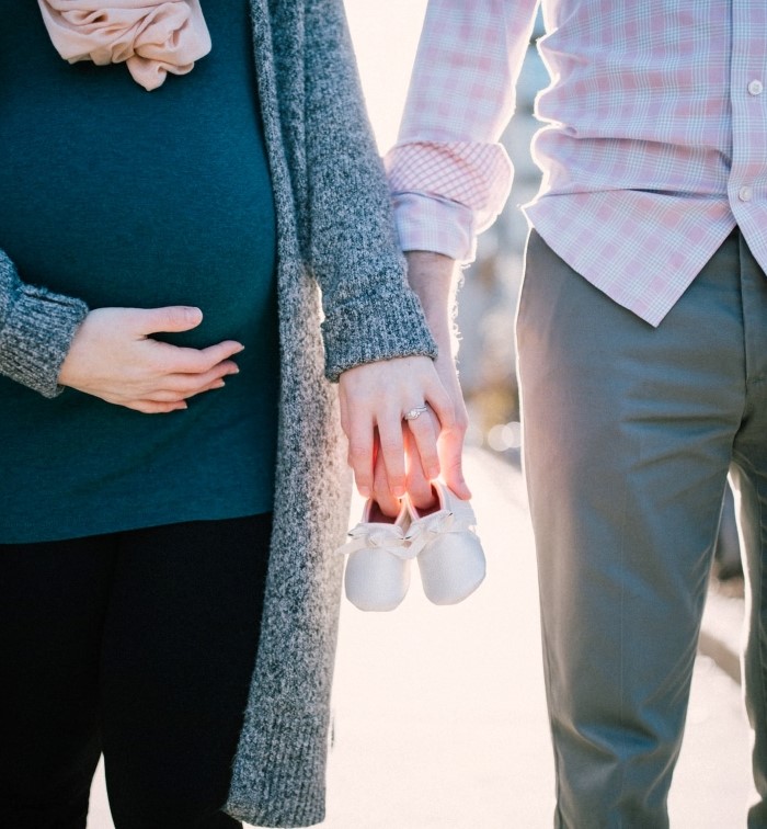 a photo of a pregnant couple